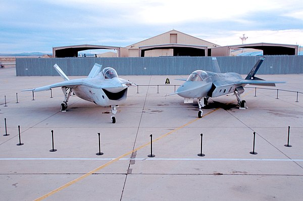 Boeing X-32 (left) and Lockheed Martin X-35 (right) JSF demonstrators.