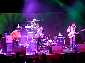 American psychedelic pop band Yeasayer (pictured) produced a remix of "Saturday Night". Yeacon.jpg