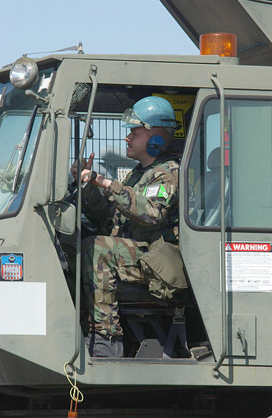 File:021010-F-TR874-005, Yokota Air Base, Japan (AFPN)- TSgt Rob Jalbert, a member of an aircraft recovery team from the 374th Maintenance Squadron, Yokota Air Base, Japan, operates a 60-ton crane to hoist a crippled 021010-F-TR874-005.jpg