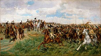 Картина, показваща маси кирасири, нахлуващи покрай Наполеон, докато размахва шапката си
