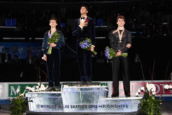 The men's podium. From left: Patrick Chan (2nd), Evan Lysacek (1st), Brian Joubert (3rd).