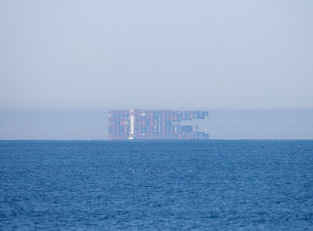A Fata Morgana of a cargo ship seen off the coast of Oceanside, California