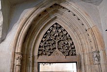 Portal of the Old New Synagogue in Prague using vine-leaf motifs, after 1270. Altneusynagoge - Portal.jpg