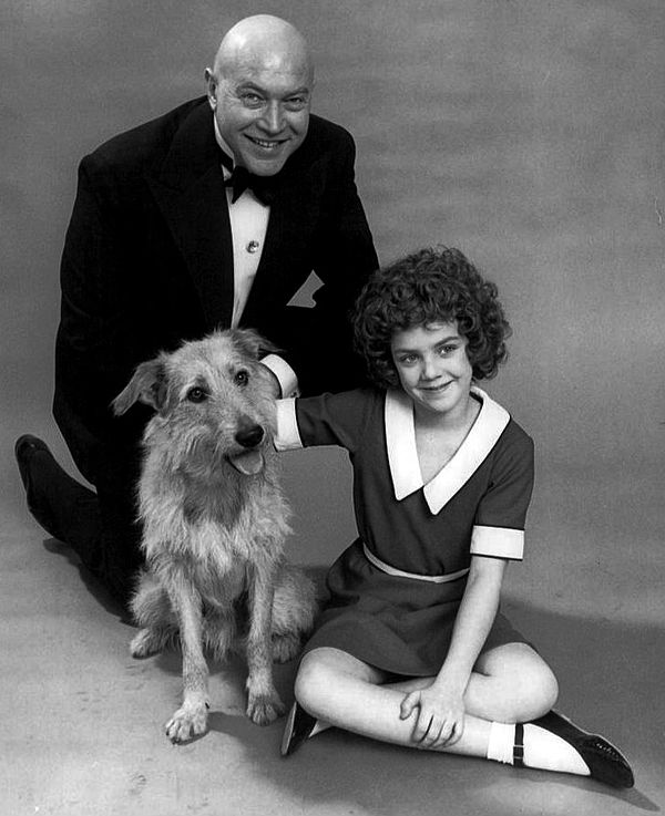 Members of the original Broadway cast for Annie: Andrea McArdle as Annie, Reid Shelton as Daddy Warbucks, and Sandy