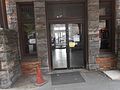 Entrance from the parking lot. The station is also a post office.