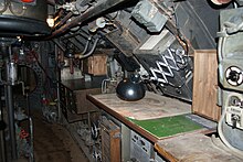 The cramped, equipment-filled setting of a submarine film, Das Boot (1981), recreated in the Bavaria film studio Bavaria Filmstudio Das Boot 4.jpg