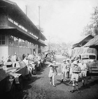 2/3rd Machine Gun Battalion personnel at Arinem Plantation, Java Blackforce machine gunners with armoured cars (AWM image 043856).jpg