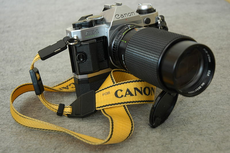 File:Canon AE1 with telephoto lens.jpg