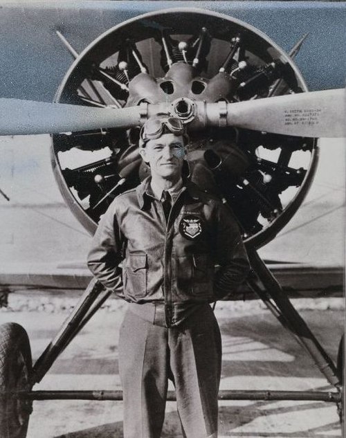 Capt. C.L Chennault poses in front of a Boeing P-12E, 1934 as leader of "The Flying Trapeze".