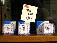A sign in a shop window in Italy proclaims "No Tic Tac". Clocks no tic tac.JPG