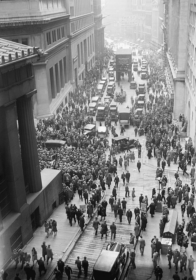 A crowd gathering on Wall Street after the 1929 stock market crash, which led to the Great Depression