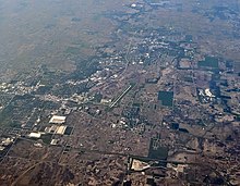 Aerial view of DeKalb, with airport (center)