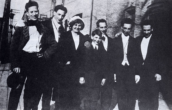 The only known photo of the entire surviving Marx family, c. 1915. From left: Groucho, Gummo, Minnie (mother), Zeppo, Sam (father), Chico, and Harpo.