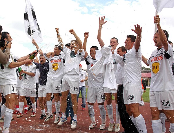 "U" Cluj players celebrating the promotion in the Liga I in 2007.