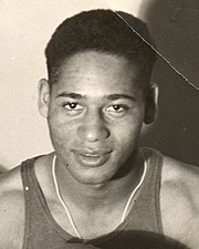 Tunnell played basketball for the racially integrated District 12 team at Coast Guard Station Alameda in 1943. Emlen L. Tunnell.jpg