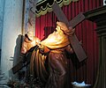 A sculpture of Padre Pio helping Christ to bear the cross in the San Salvatore in Lauro church in Rome