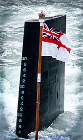 HMS Trafalgar wearing a 'masthead' White Ensign flag HMS Trafalgar, a Trafalgar Class Attack Submarine, on transit to the fleet review in Portsmouth Dockyard, part of the Trafalgar 200 celebrations. MOD 45145964.jpg