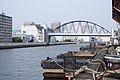 阪神なんば線安治川橋梁。この橋の袂の両端にトンネル入口の塔がある。