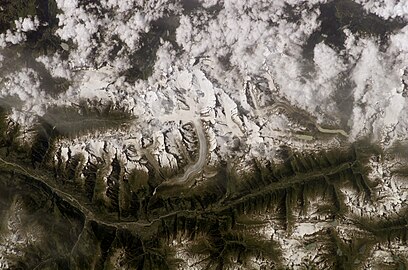 ISS photo of Kandersteg valley and Oeschinen Lake (in left upper corner, Blüemlisalp glaciers nearly under clouds), Kanderfirn and Aletsch glacier in the Alps.