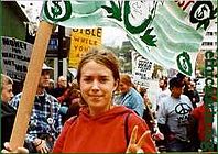 A 2003, Los Angeles anti-war protester making the peace sign.