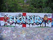 Graffiti depicting Wayne Rooney and Roy Hodgson, around the time of the 2014 World Cup Ingerland World Cup graffiti , Markhouse BMX track, N15.jpg