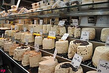 Halva of various tastes, including chocolate, rum and raisins, bamba, and coffee beans