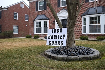 A lawn sign put up in Clayton in protest of Hawley on January 16