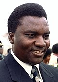 Foto van president Juvénal Habyarimana die op 25 september 1980 met entourage arriveert op de luchtmachtbasis Andrews, Maryland, VS.