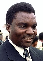 Photograph of President Juvénal Habyarimana arriving with entourage at Andrews Air Force Base, Maryland, USA on 25 September 1980.
