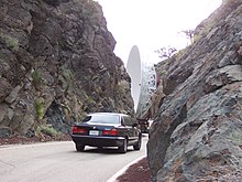 One of the Leighton dishes being driven on a mountain road, through a slot canyon, on its journey from OVRO to the CARMA site in June, 2015 LeightonDishOnTheMove.jpg