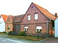 Farm with residential house, side building and gatehouse