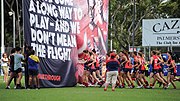 Thumbnail for File:Melbourne AFLW running through banner.jpg