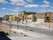 Homes are territorial- or pueblo-style and stuccoed with flat roofs, 2011.