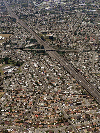 historic location of Mt. Eden, currently the intersection of Interstate 880 (vertical freeway) and State Route 92 (second overpass from top of photo) Palma Ceia Park 07816.JPG
