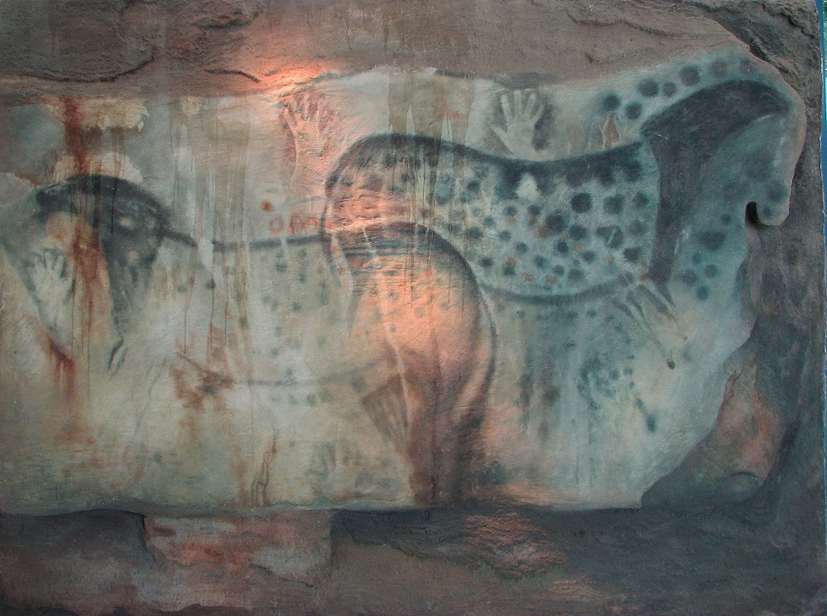 Painting of horses and hands from the Pech Merle cave. 