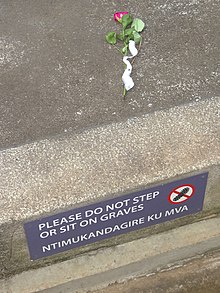 Please Do Not Step or Sit on Graves - Genocide Memorial Center - Kigali - Rwanda.jpg
