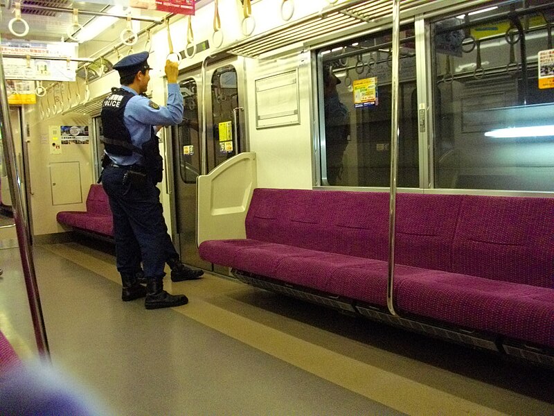 File:Policing train by Narita International Airport Security Force-1.JPG