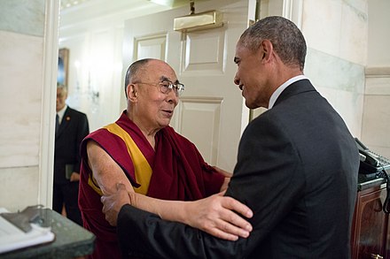 The 14th Dalai Lama meeting with U.S. President Barack Obama in 2016. Due to his widespread popularity, the Dalai Lama has become the modern international face of Tibetan Buddhism.[61]