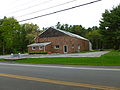 Raynham Center Water District office building. Located at 280 Pleasant Street, Raynham, Massachusetts 02767-1636. Southeast (front) and northeast sides of building shown.