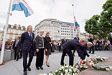 U.S Secretary of State John Kerry lays flowers at Monument of Remembrance in Luxembourg City, Luxembourg in response to the deadly terror attack in Nice, France. Secretary Kerry Lays Flowers at Monument of Remembrance in Luxembourg City (28243057742).jpg