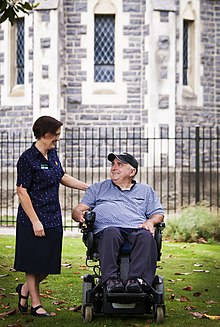 A resident of St John of God Trust and a caregiver in Halswell, New Zealand St John of God Hauora Trust.jpg