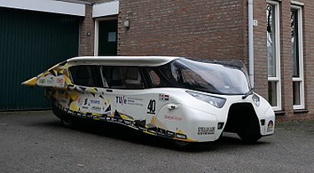 Stella Lux, a solar-powered family car in front of a house (cropped).jpg