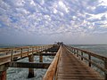 * Nomination The Swakopmund Jetty under a cloudy sky --Domob 15:15, 23 June 2019 (UTC) Removed tilt, now the horizon is straight --Domob 18:15, 23 June 2019 (UTC) * Promotion Clear ccw tilt --Poco a poco 16:39, 23 June 2019 (UTC)  Done --Domob 04:31, 24 June 2019 (UTC)  Support Ok, sharpness is just ok and WB not 100% sure --Poco a poco 20:31, 24 June 2019 (UTC)