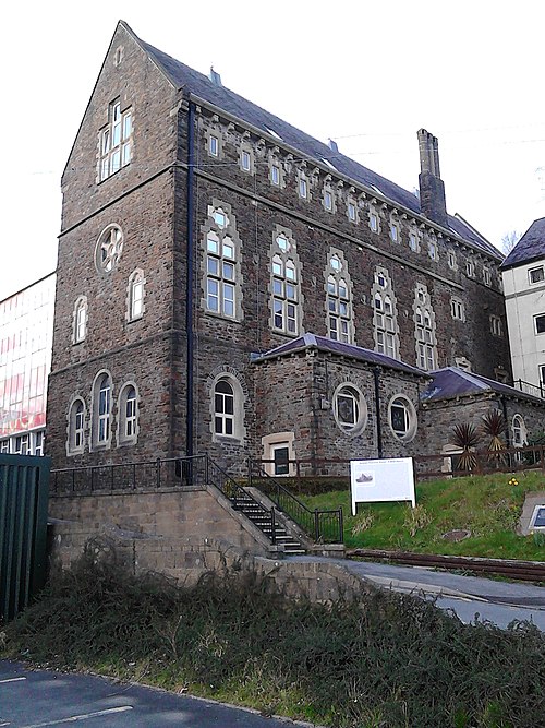 The main surviving structure of the former Swansea Grammar School on Mount Pleasant, mostly destroyed during the Swansea Blitz of 1941, was renamed th