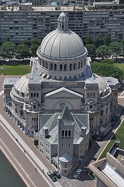 The First Church of Christ, Scientist at the Christian Science Center in Boston with the original Mother Church (1894) in the foreground and the Mother Church Extension (1906) behind it.[1] (Source: Wikimedia)