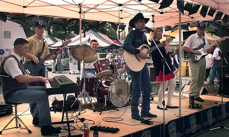 File:The country band Frontier entertains the crowd during the Columbus day carnival on Yongsan Army Post, Seoul, Korea. The band members are all active duty Army soldiers stationed at Y - DPLA - e613c2a3d4fe77f20a8abdb824253af4.jpeg