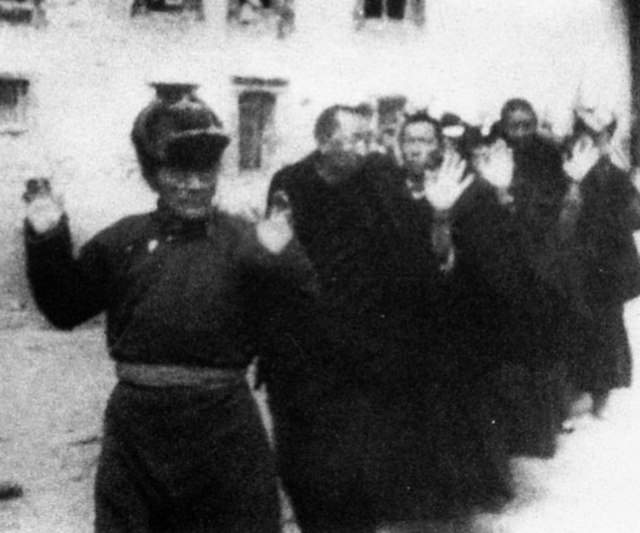 Tsarong Dazang Dramdul and several Tibetan monks captured by the PLA during the uprising