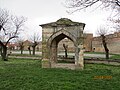 Open turbe, domed with a columns.