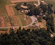 An aerial view of Twin Oaks' main entrance and communal garden Twinoaksaerial.jpg