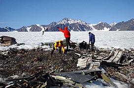 US Navy 040811-N-0331L-004 Recovery personnel examine the wreckage of a Navy P-2V Neptune aircraft that crashed over Greenland in 1962.jpg